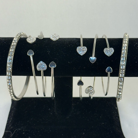 Set of eight silver tone bangles with clear rhinestones - Picture 2 of 4